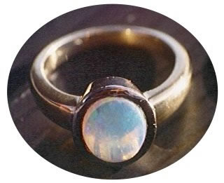Blue water opal ring in 18ct gold